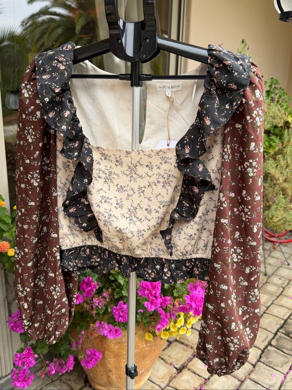 NWT Free the Roses Anthropologie floral ruffled long sleeve blouse.